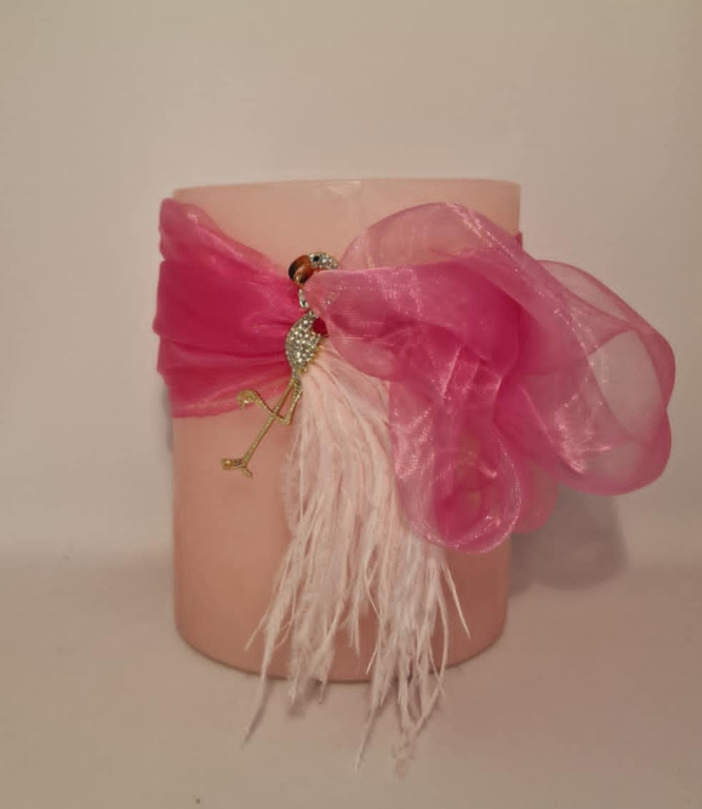 Fuchsia sjaal en flamingo broche