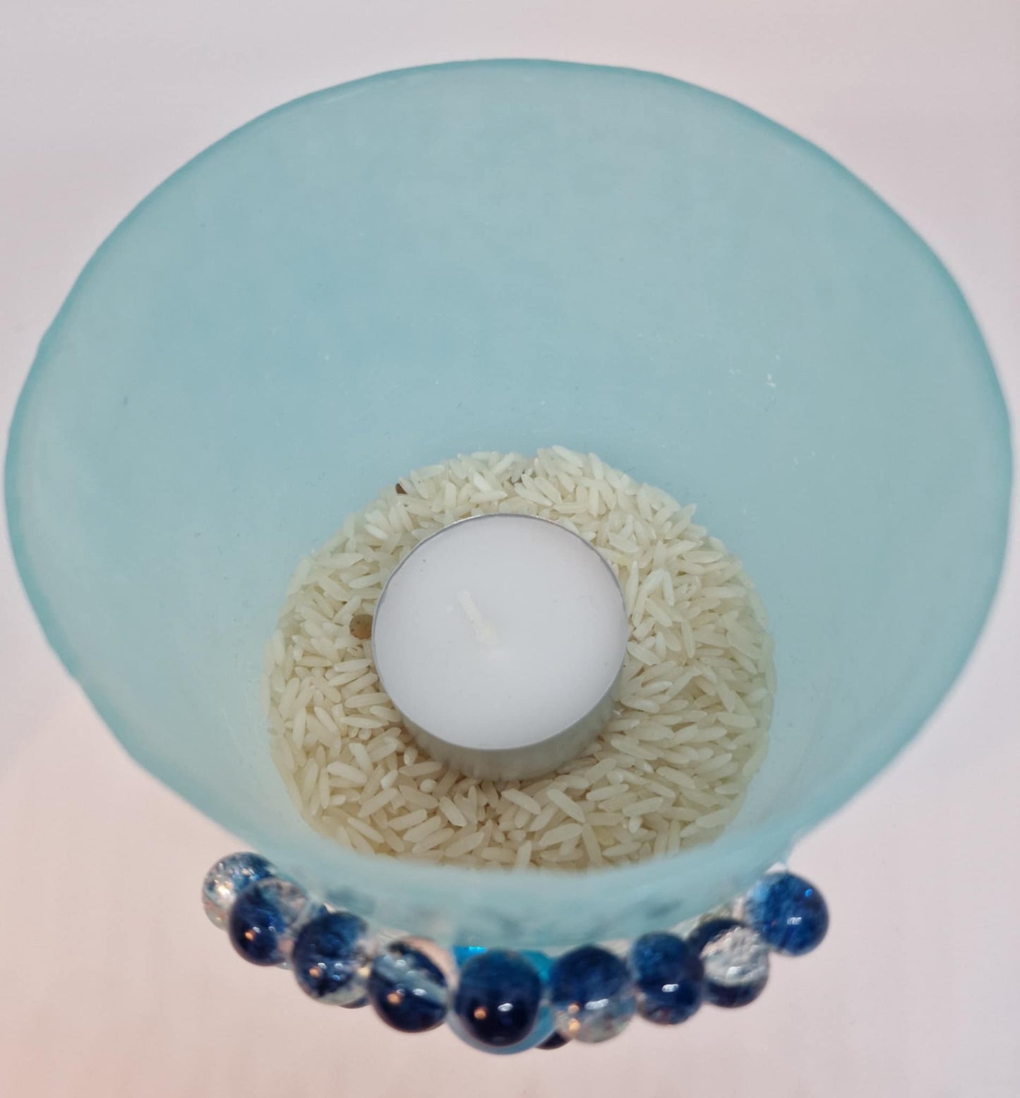 Licht blauw kaarslantaarn, Oog